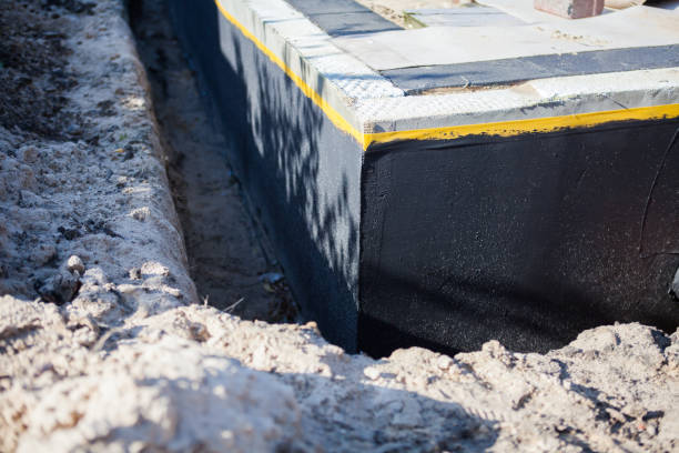 Professional Basement Waterproofing technician working in Fort Jennings, OH